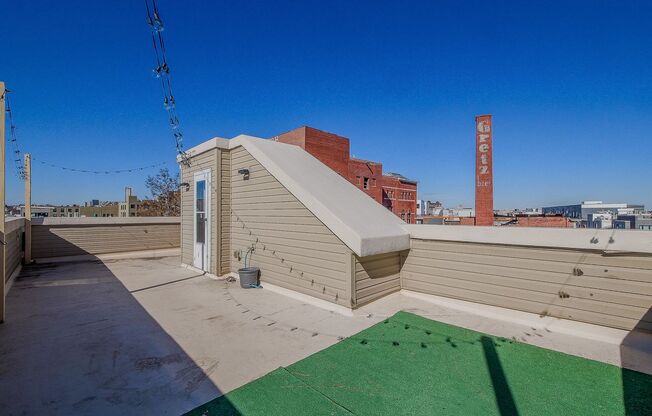 Three Bedroom Modern Olde Kensington Condo with Roofdeck