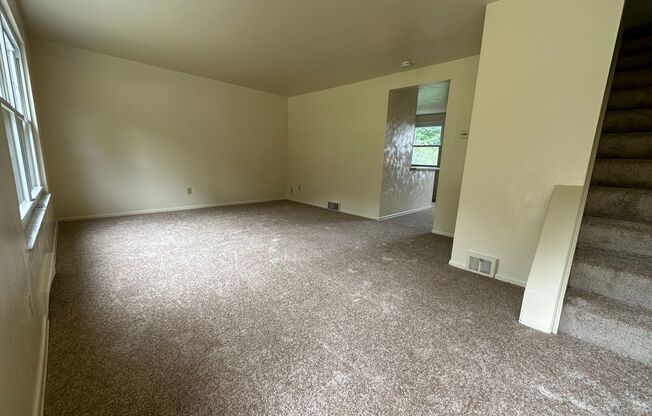 Enticing 2BR Townhouse with Central A/C and Attached Garage! Call Today!