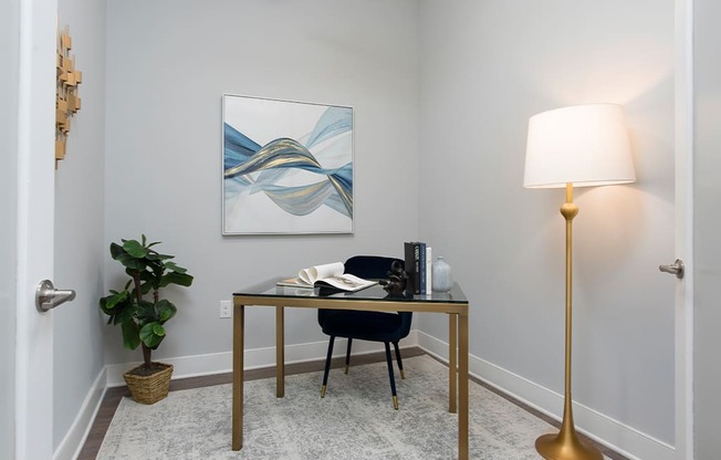 Den with desk and chair at St Mary's Square North Apartments, North Carolina