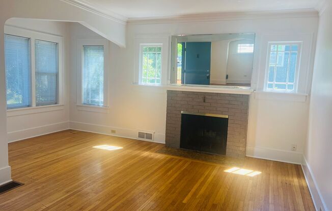 Charm Galore in this Beautiful 1920s Home near Fremont. Fresh Paint inside and out! New carpet
