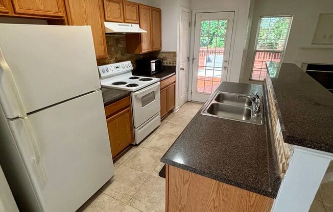 **PRICE IMPROVEMENT** 141 Chastain Loop: 3 BR / 2.5 BA townhouse with private backyard and large deck. Only minutes to Bullsboro Drive and I-85. Available NOW!!