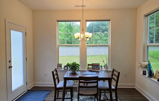 Centrally located, brand new 3-bedroom, 2.5-bathroom w/ Lawncare included
