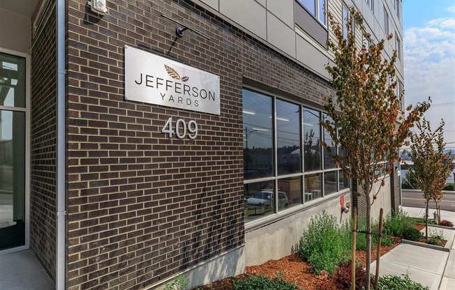 a brick building with a sign that says jefferson yards at Jefferson Yards, Washington