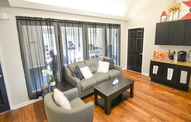 a living room with a couch and a table