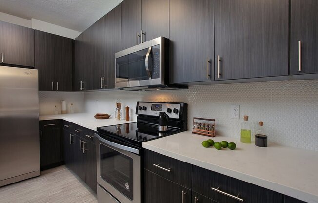 Stainless steel appliances and designer backsplash