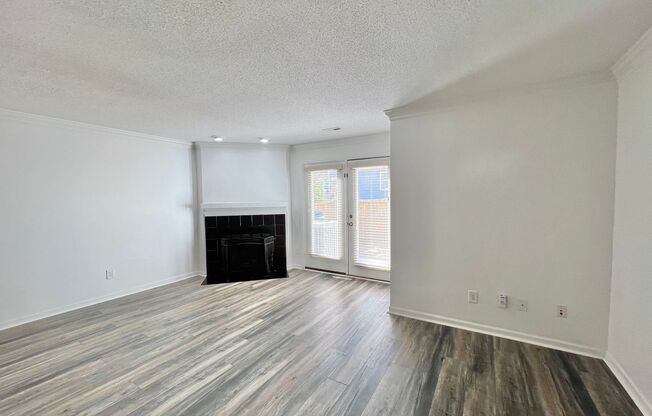 Newly Remodeled 2BD, 2.5BA Raleigh Townhome with a Fenced Yard and Private Patio in an HOA Community with Amenities