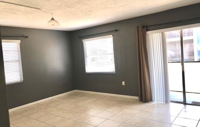 MOVE IN JUNE! WATER INCLUDED! In Windmill Point- 1st floor 2X1 condo with all tile floors!! Nice SS/black appliances! Open dining/living area!
