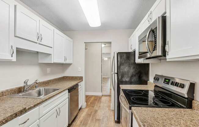 Kitchen with appliances at Summerwood Apartments, Santa Clara, California