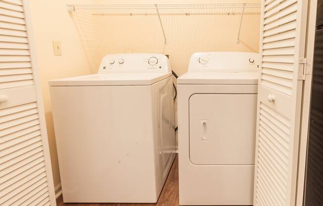 washer and dryer in a laundry closet
