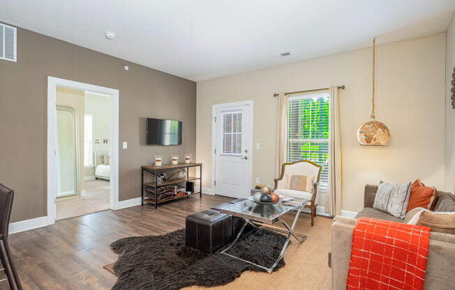 a living room with a couch and a television