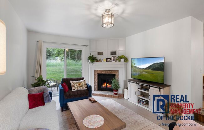 Bright and Updated Townhouse with Finished Basement and Garage