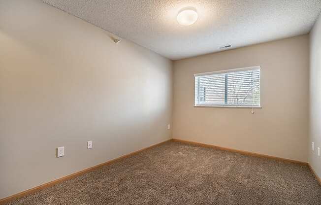 Cozy bedroom at Skyline View Apartments in Lincoln NE