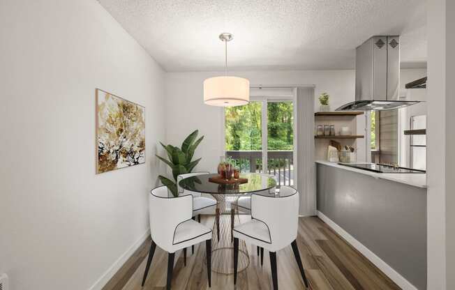 Dining room with a table and chairs  at Larkspur West Linn, Oregon, 97068