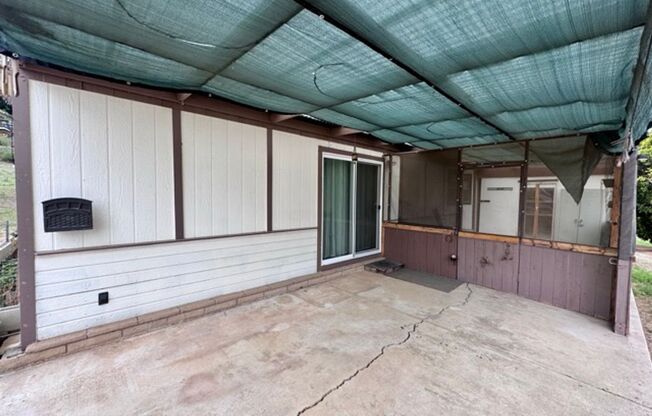 2 bedroom 2 bathroom ranch style single story home for LEASE with horse stables on site!