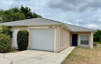 2 Bedroom, 2 Bath Duplex with 1 Car Garage in Deltona - Priced to Rent!
