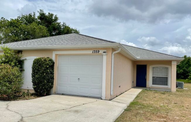 2 Bedroom, 2 Bath Duplex with 1 Car Garage in Deltona - Priced to Rent!