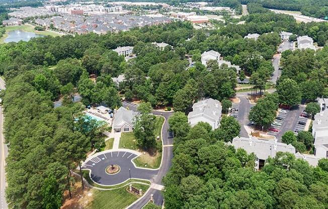 an aerial view of a city with trees and buildings at Trails at Short Pump Apartments, Richmond, VA, 23233
