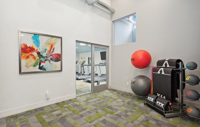 Community Fitness Center with Equipment at Creek 2645 Apartments in Sacramento, CA.