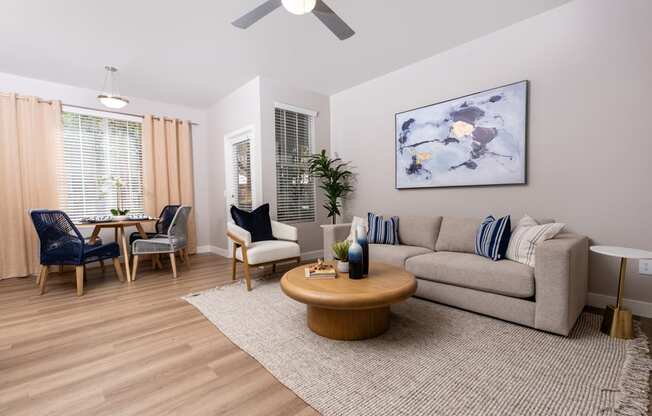 a living room with a couch and a table