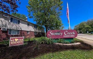 the signs in front of the stony creek apartments