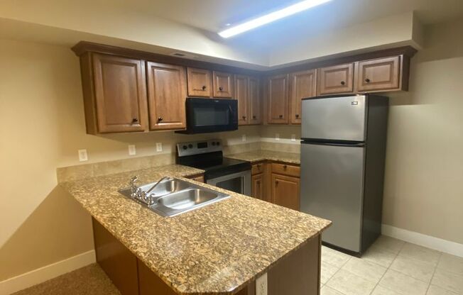 Rosecroft - 9825- Unit (103) LLC