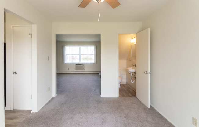 This is a photo of the dining room in the 1004 square foot, 2 bedroom, 1.5 bath townhome floor plan at Lake of the Woods Apartments in Cincinnati, OH.