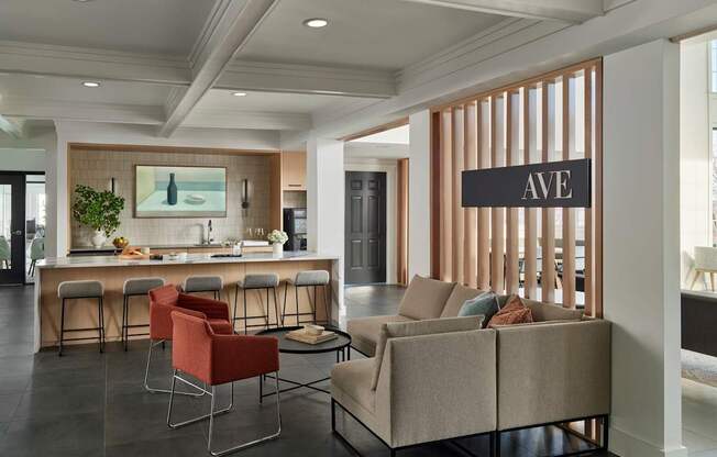 A modern living room with a bar area and a sofa.
