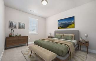 A bedroom with a large bed and a painting on the wall.