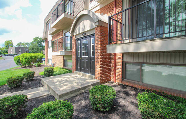 This is a photo of a building entrance at Village East Apartments in Franklin, OH.
