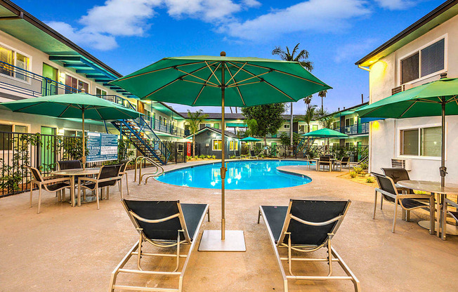 The Island Apartments pool area and lounge chairs