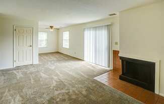 Apartment Living Room with a Fireplace at Williamsburg on the Lake Valparaiso