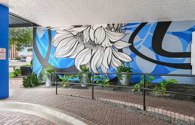 Colorful mural in the entrance area at The Grand at Upper Kirby apartments in Houston, TX