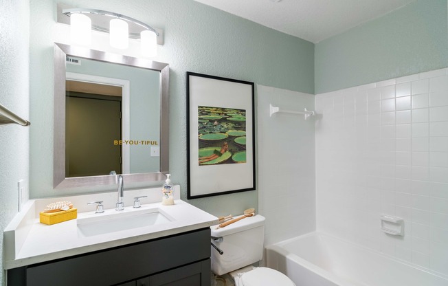 Bathroom with tub and shower combo