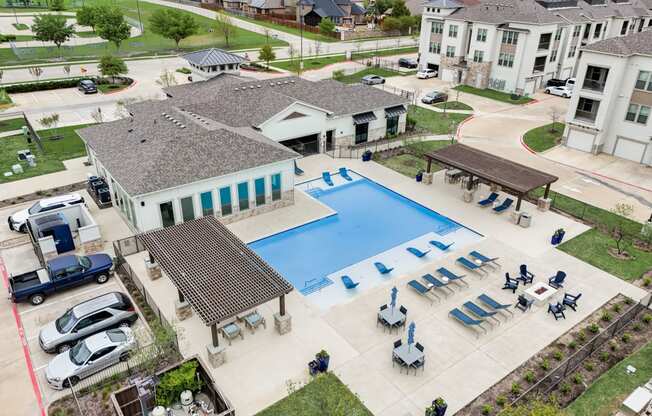 an aerial view of the pool at the estates at spring valley