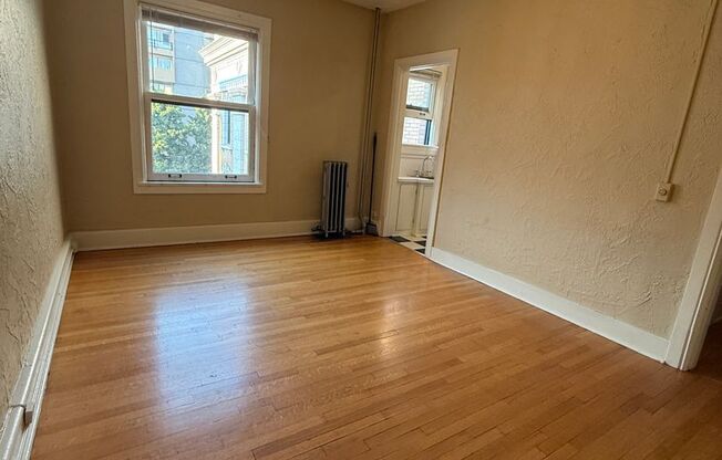 115 W Olympic Pl