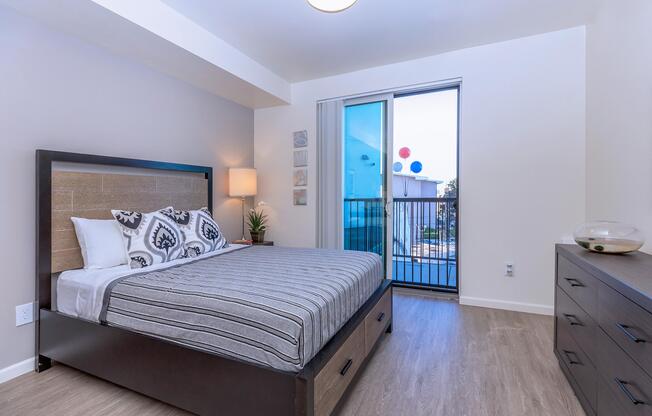 Apartments in Daly City CA for Rent-Brunswick Street Bedroom with Private Balcony, Hardwood-Styled Flooring, and Spacious Floor Plan Area