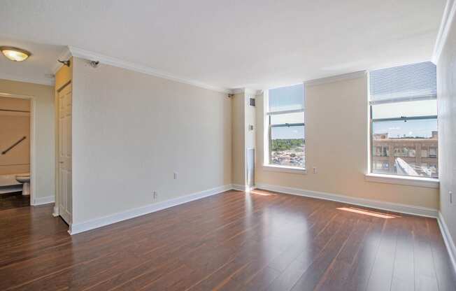 Spacious living room with great view. Hardwood floors. Dining room. One Bedroom Apartments in Saginaw