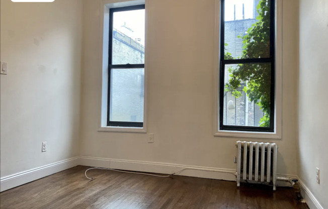 215 E 4 ST
