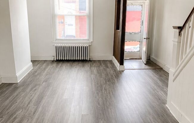 Bright 2BR Port Richmond Row Home with Large Living Space & Basement Storage