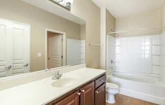 a bathroom with a sink toilet and bathtub