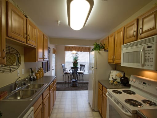 Large eat in kitchen with plenty of natural light at The Summit at Owings Mills Apartments, Maryland, 21117