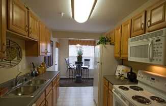 Large eat in kitchen with plenty of natural light at The Summit at Owings Mills Apartments, Maryland, 21117