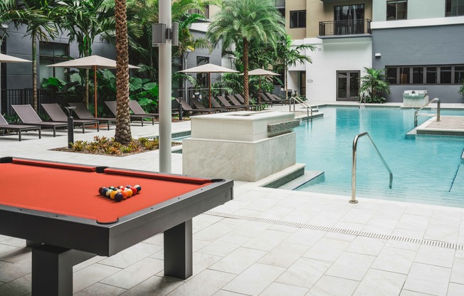 Play pool by the pool and enjoy the perfect blend of relaxation and recreation.