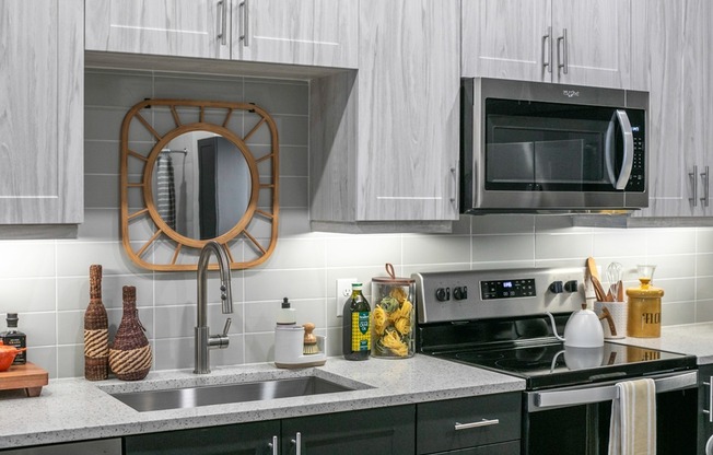 Upgrade your kitchen with a touch of style: our stylish tile backsplash adds elegance and charm to your culinary space.