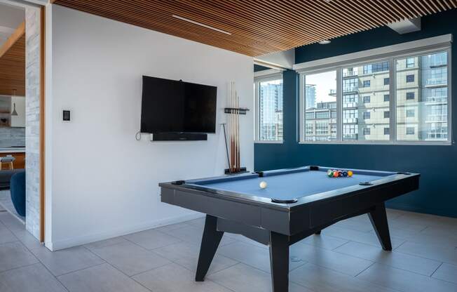 One BR Luxury Apartments in Portland OR - Couch9 Apartments - Billiards Room with Billiards Table and Flat Screen TV