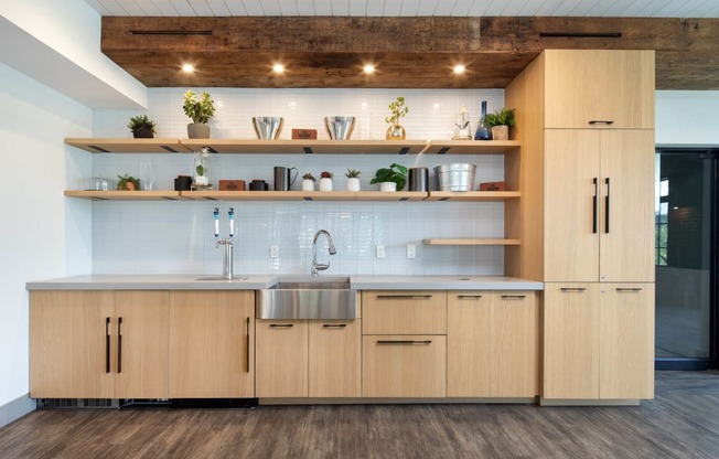 a kitchen with wooden cabinets and a sink