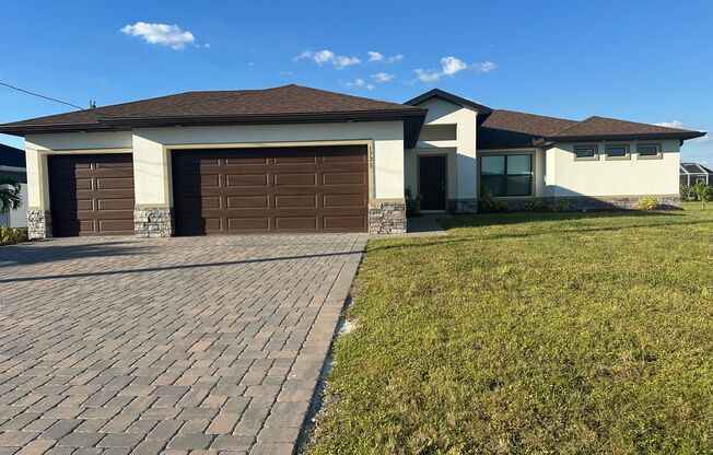 4 Bedroom 2 Bathroom 3 Car Garage- NW Cape Coral Home with Screened Lania -AVAILABLE NOW