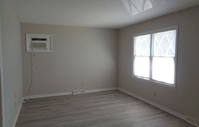 Lovely three bedroom, one bath home nestled in an attractive neighborhood setting.