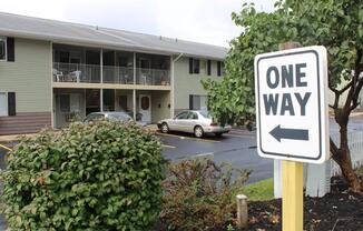 One way sign in front of Entrance