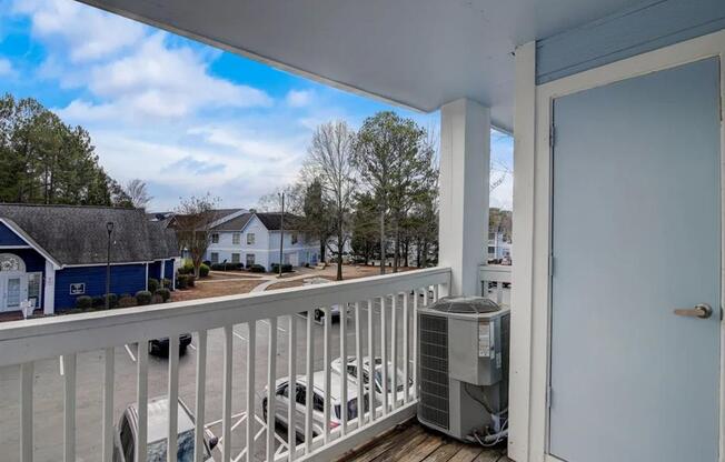 the view from the deck of a house with a heater on the balcony at The Sapphire, Georgia, 30035